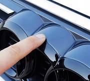 Znak AUDI černý lesk 286x100mm